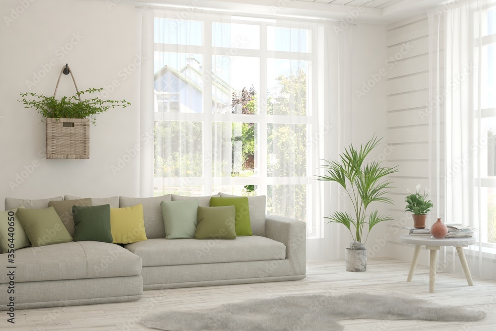Fototapeta premium White living room with sofa and summer landscape in window. Scandinavian interior design. 3D illustration