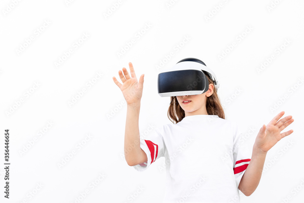 Girl playing with VR glasses with white background. VR experience. Concept of future. Girl playing with VR glasses with white background. VR experience. Concept of future.