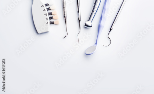 dental tools on white background with copy space photo