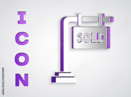 Paper cut Hanging sign with text Sold icon isolated on grey background. Sold sticker. Sold signboard. Paper art style. Vector Illustration.