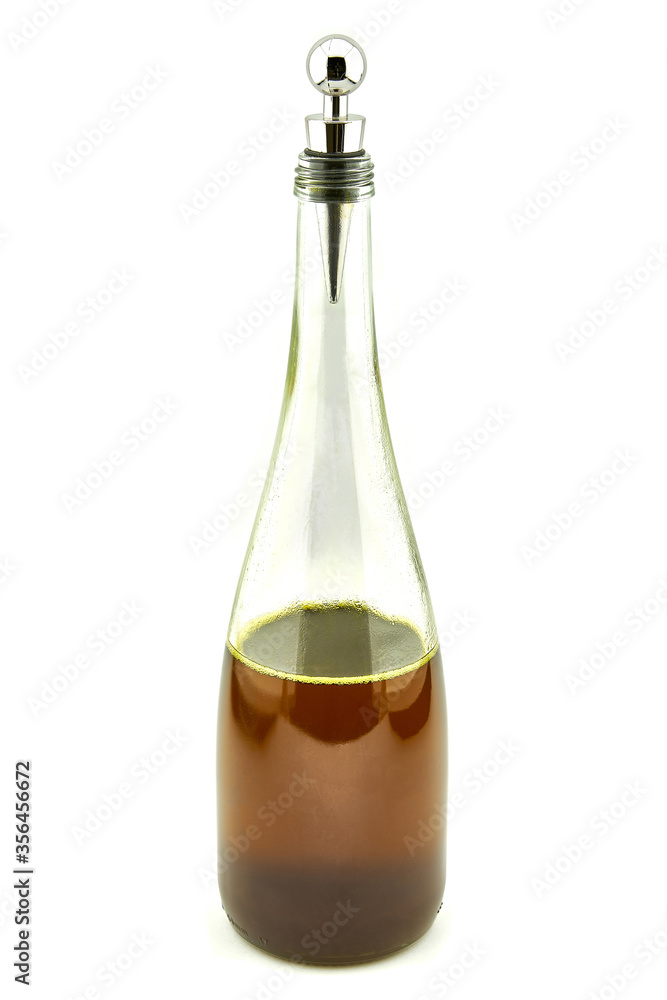 glass bottle with soybean oil on a white background glass bottle with soybean oil on a white background