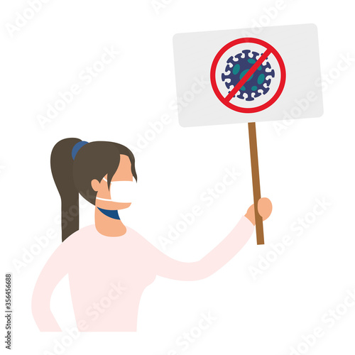 young woman wearing medical mask with protesting banner