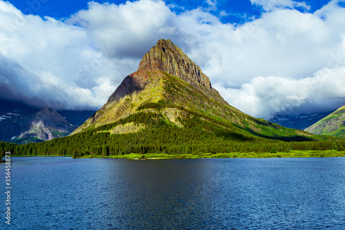 0000316 Clouds over Swiftcurrent Lake's Grinnell Point at Glacier National Park Montana 5043 photo