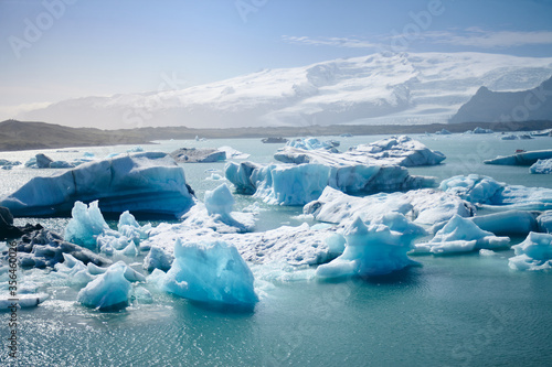 Obraz na płótnie Jokulsarlon, the largest ice lagoon in Iceland with floating icebergs. Glacier lake with icebergs w salonie