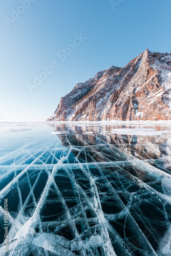 Beautiful crack that goes beyond the horizon on the ice of lake Baikal.