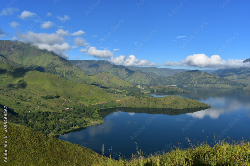 Spring view of green mountain with Toba lake. Samosir island, Indonesia