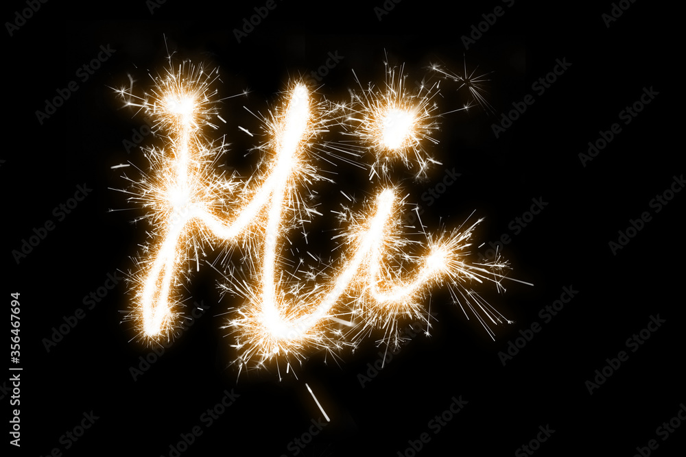 The inscription Hi on a black background with sparklers using a simulated long exposure. The inscription Hi on a black background with sparklers using a simulated long exposure.