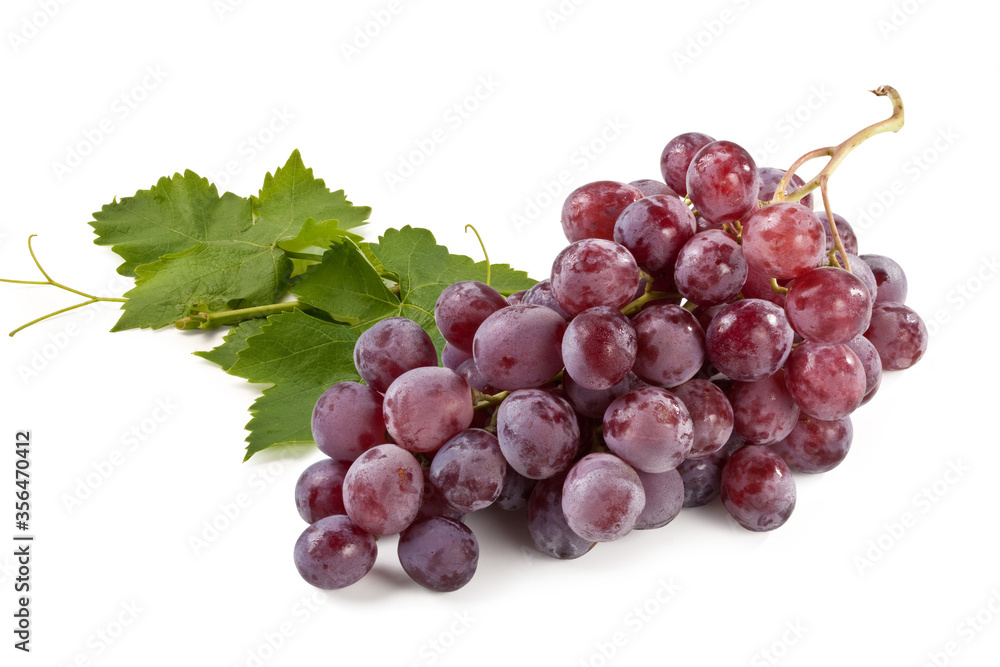 Fototapeta premium Red grapes with leaves isolated on white background