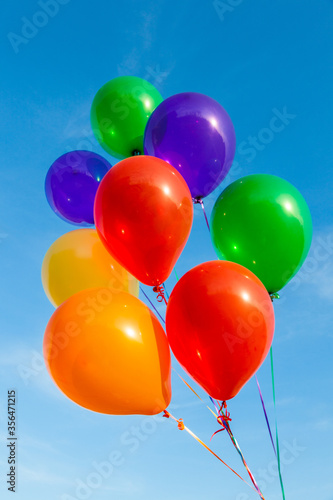 Colorful balloons on a beautiful blue sky