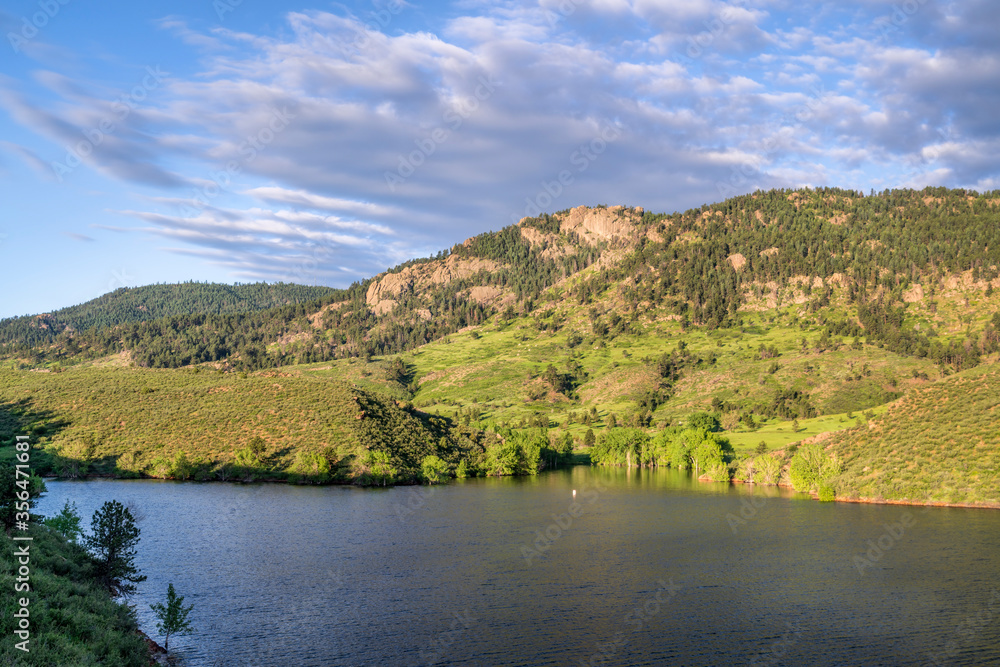 summer view of a lake at Rocky Mountains foothills -  Horsetooth Reservoir in northern Colorado with Arthur's Rock in background