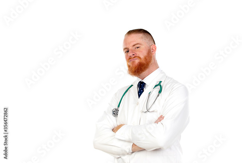 Redhead doctor with a medical gown