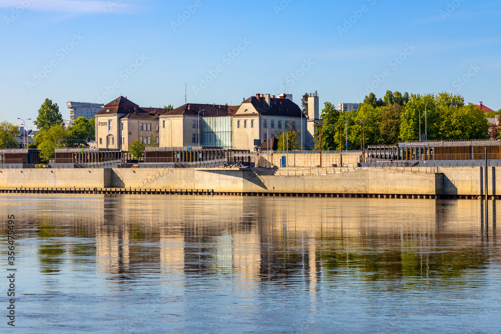 Fototapeta premium Karowa Clinical Hospital - Szpital kliniczny im. Ksieznej Anny Mazowieckiej - at Wybrzeze Kosciuszkowskie embankment over Vistula river in Warsaw, Poland