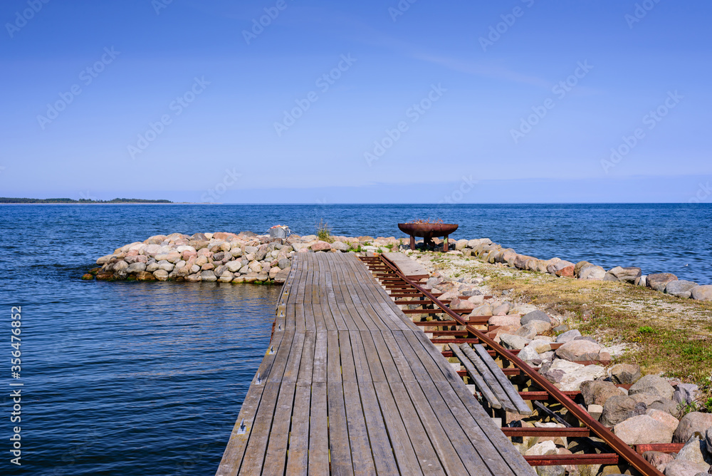 Baltic sea. Picturesque wooden pier in the village Viinistu, Estonia Baltic sea. Picturesque wooden pier in the village Viinistu, Estonia