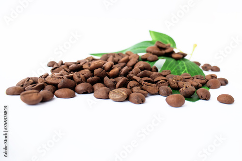 offee with leaves. coffee beans and green leaf on a white background isolated.