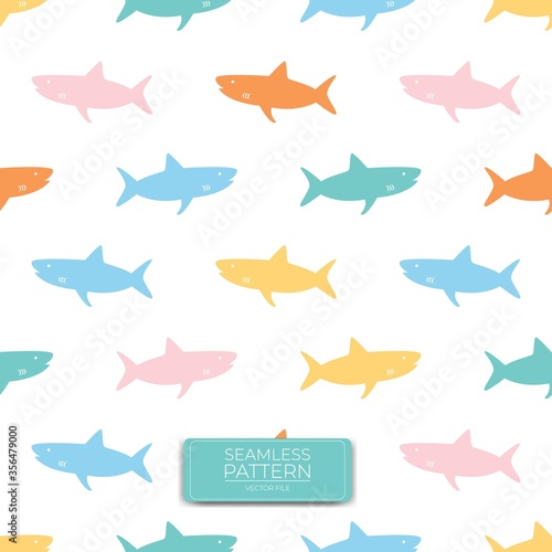 Seamless pattern of colorful shark. Playful shark vector background illustration. Great for fabric  background  wrap