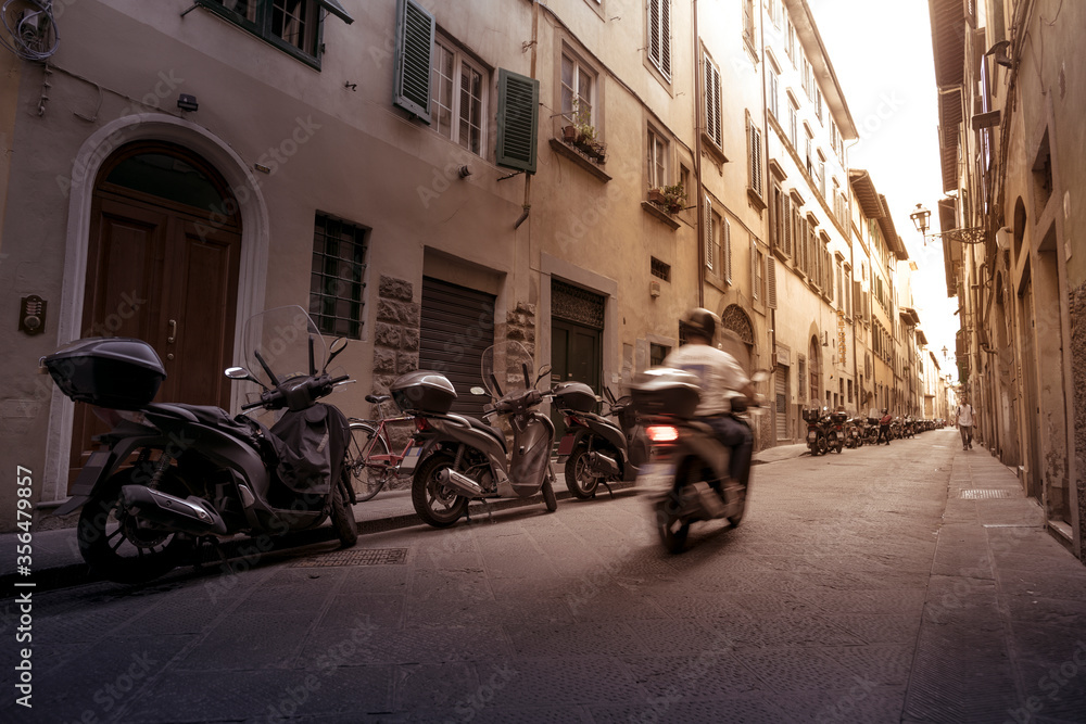 A italian motorcycle on a classic Florence street