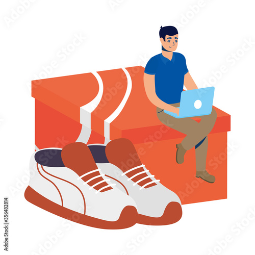business online ecommerce with man using laptop buying tennis