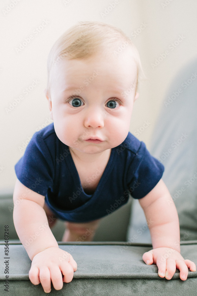 Baby staring ointo camera with wide eyes Baby staring ointo camera with wide eyes