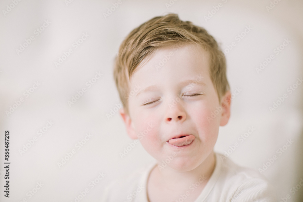 Silly Preschooler sticking out tongue up close Silly Preschooler sticking out tongue up close