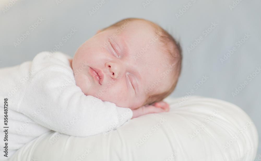 Newborn baby boy sleeping up close Newborn baby boy sleeping up close
