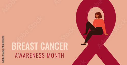 Breast cancer awareness and prevention month banner. Young woman sits on a big pink ribbon. The concept of support and solidarity with women fighting oncological disease. Vector illustration