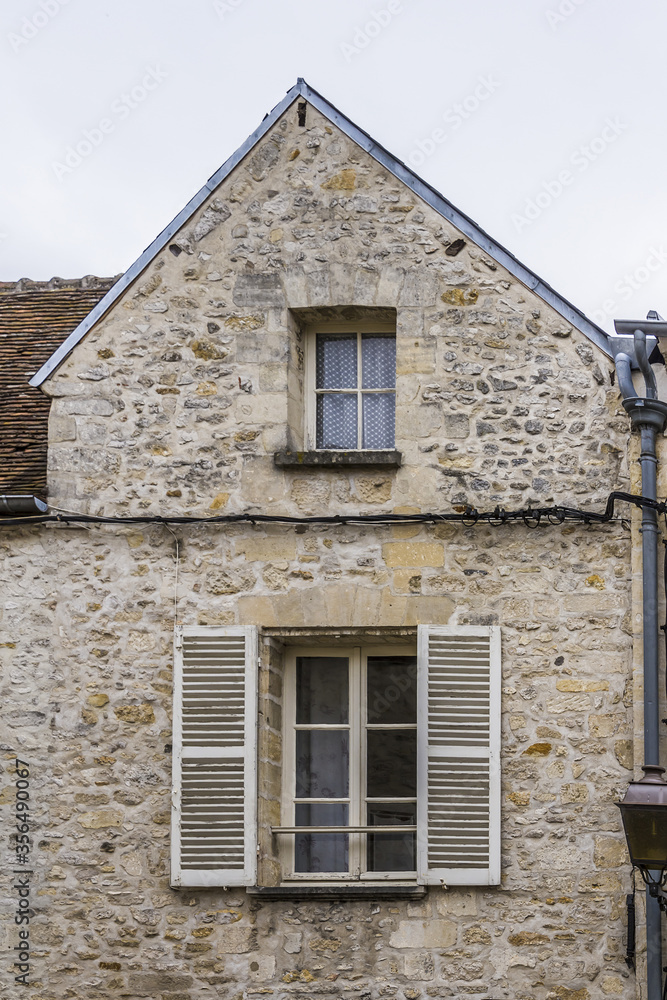 Beautiful Old Stone House in medieval city Senlis. Senlis is a commune in Oise department in northern France. Beautiful Old Stone House in medieval city Senlis. Senlis is a commune in Oise department in northern France.