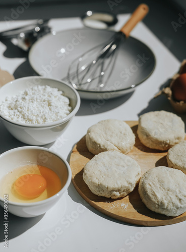 Ingredients for making cottage cheese pancakes on a table. High quality photo