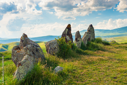 Large stones of unknown origin in the field, a landmark of Zorats Karer, Armenia photo