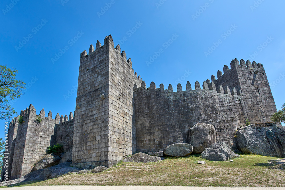 Portugal. Guimaraes. XI century castle. Walls and towers on the south side