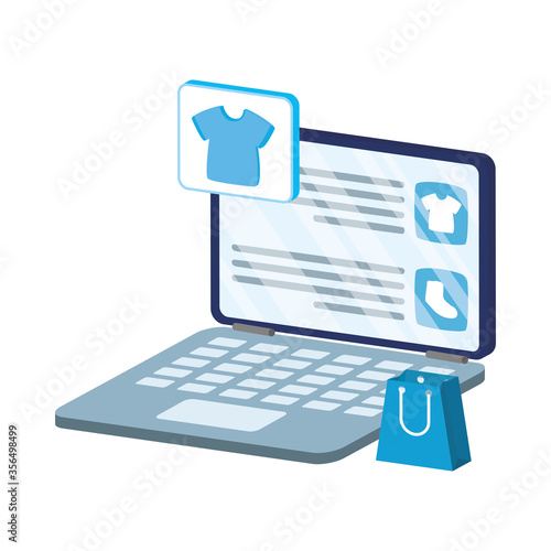 business online ecommerce in laptop with shopping bag and clothes