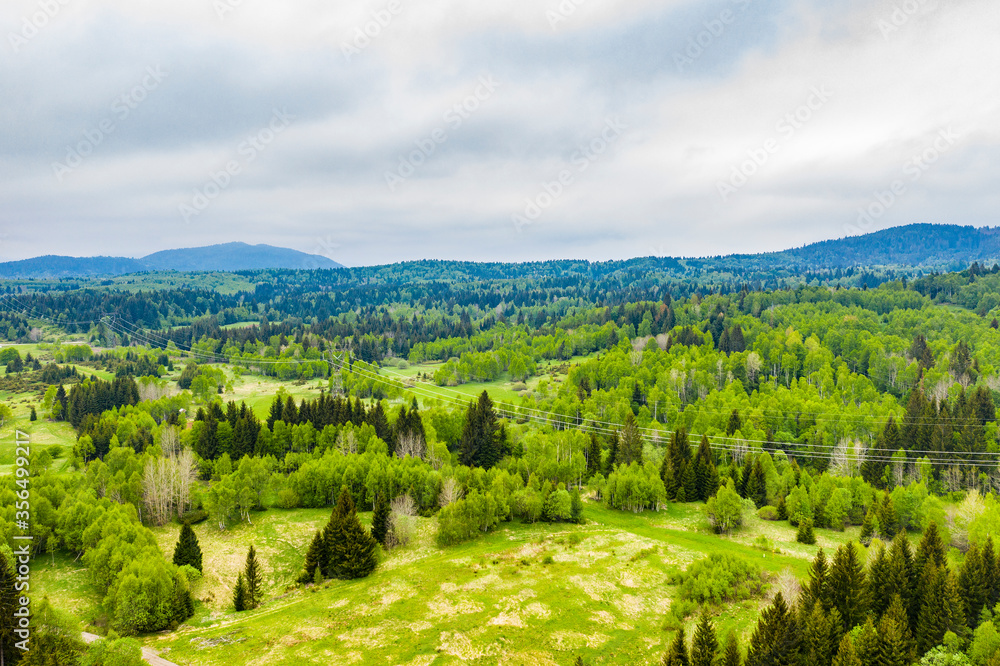 Beautiful mountain of Ravna gora, Gorski kotar, Croatia, panoramic view from drone in spring, mountain landscape in background