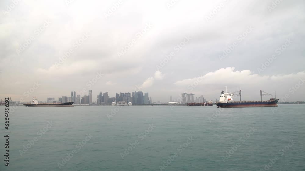 Ships are anchored in the port of Singapore. Ships stand by.
Hundreds of cargo ships anchored off the coast of Singapore. Ships are anchored in the port of Singapore. Ships stand by.
Hundreds of cargo ships anchored off the coast of Singapore.