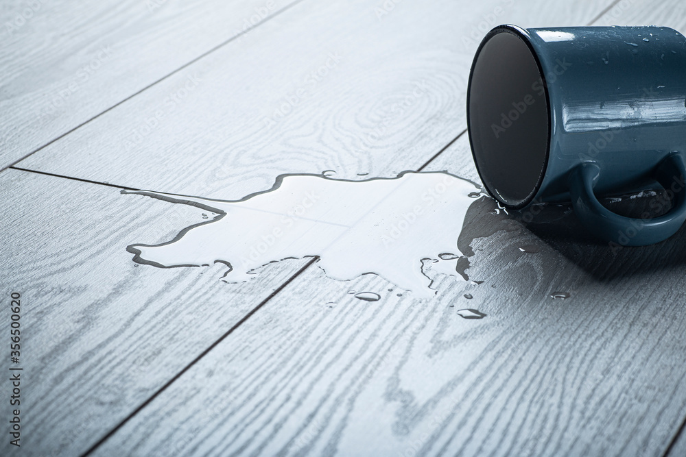 Laminate background.. Wooden laminate and parquet board with spilled