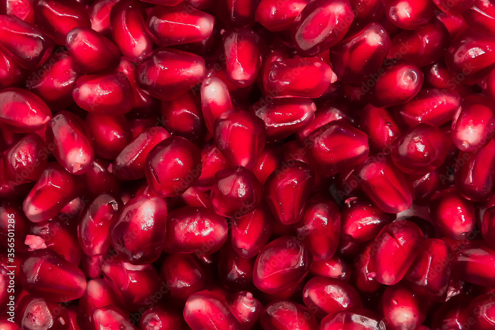 fresh pomegranate seeds macro close-up in drops fresh pomegranate seeds macro close-up in drops