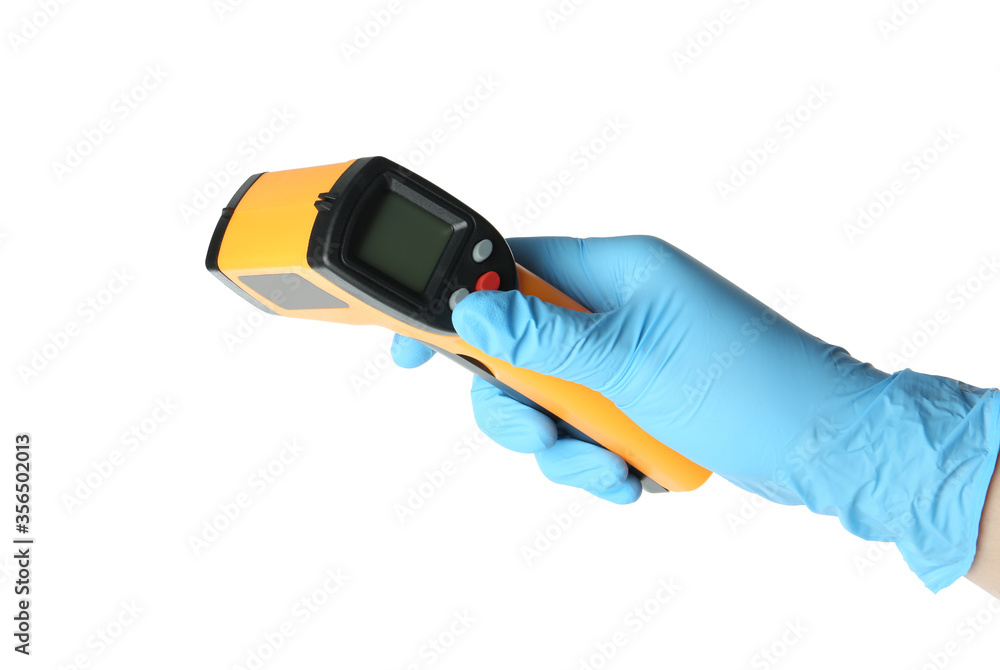 Doctor in latex gloves holding non-contact infrared thermometer on white background, closeup Doctor in latex gloves holding non-contact infrared thermometer on white background, closeup