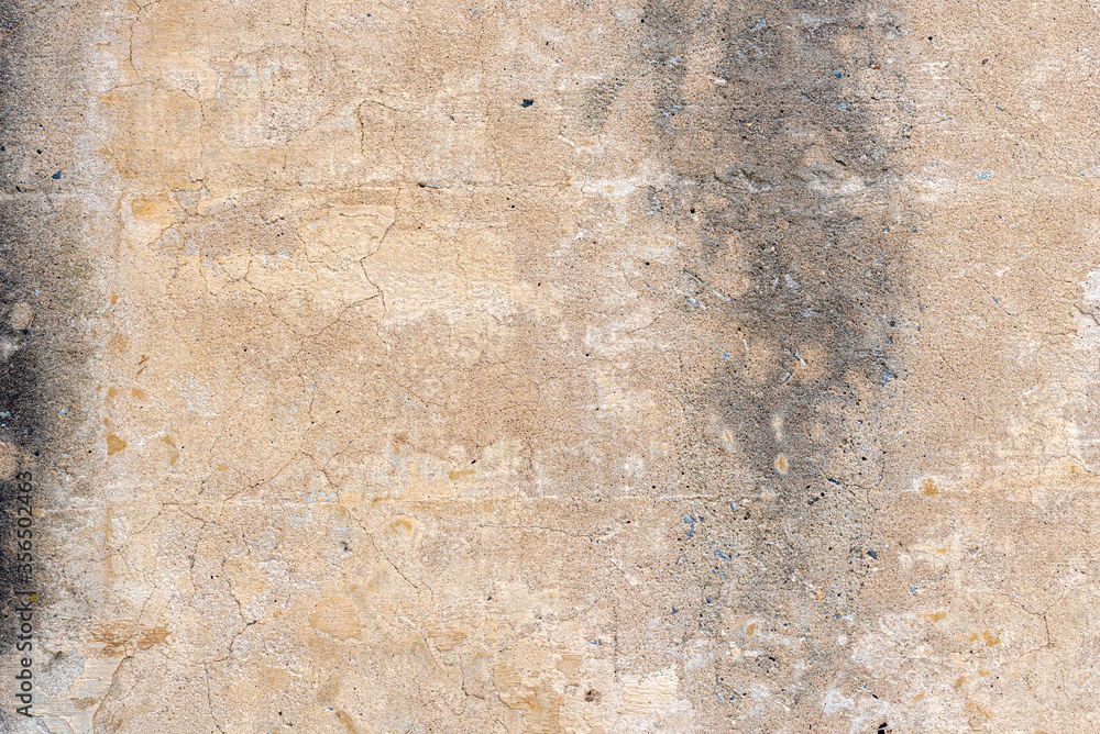 Background of a texture of an old and stained wall
