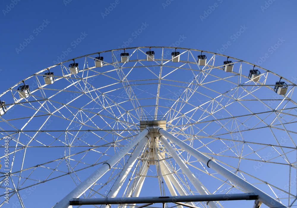 ferris wheel on a blue sky ferris wheel on a blue sky