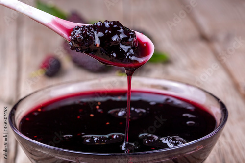 Tableau sur toile Domestic fresh mulberry jam on a rustic wooden board
