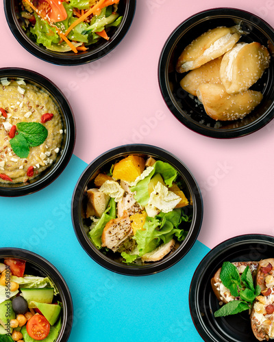 Mockup. Healthy tasty food in plastic containers on colored backgrounds