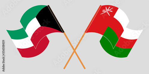 Crossed flags of Oman and Kuwait