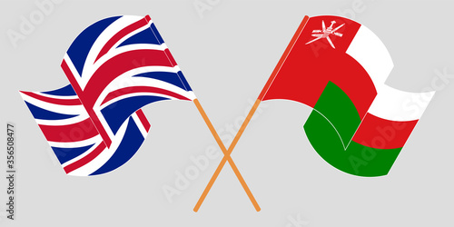 Crossed flags of Oman and the UK