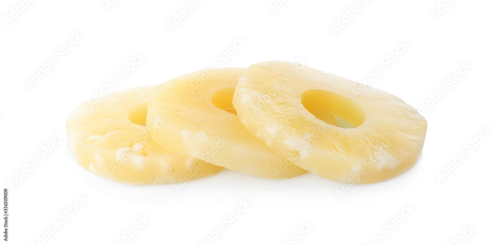 Delicious canned pineapple rings on white background Delicious canned pineapple rings on white background