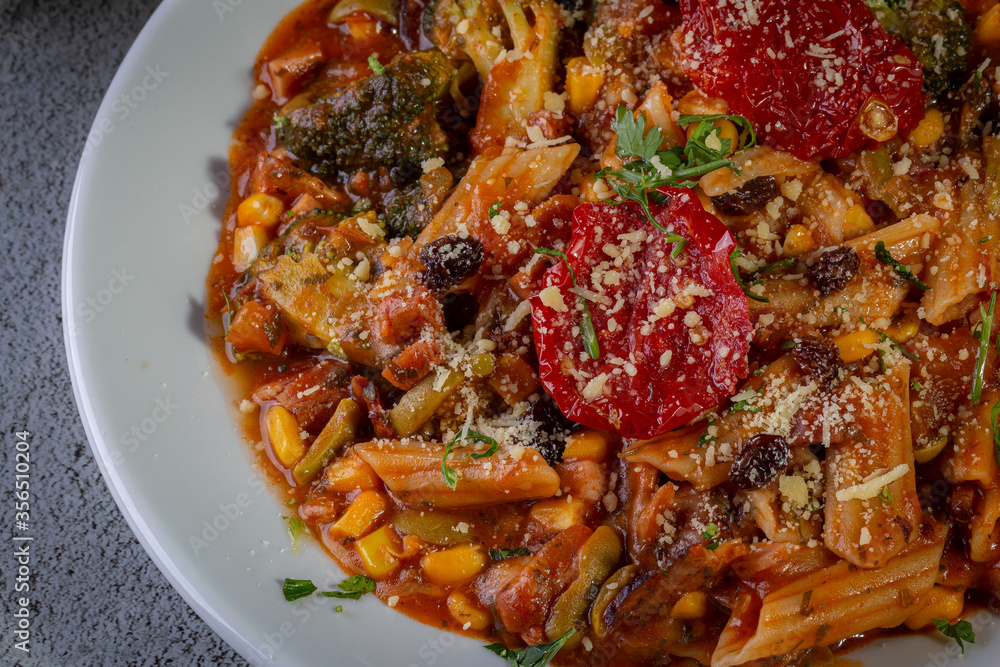 Penne pasta with tomato sauce and vegetables Penne pasta with tomato sauce and vegetables