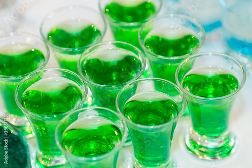 making a green caviar shot at molecular bar drink.