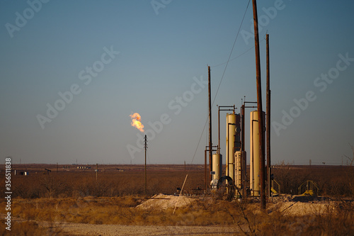 Gas flare and separators in the Permian Basin oilfield