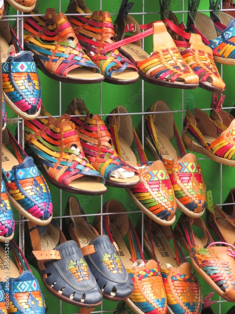 colorful traditional Mexican shoes for sale at market