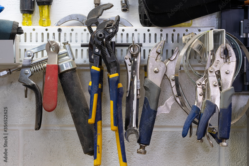 Tools hanging on workbench rack