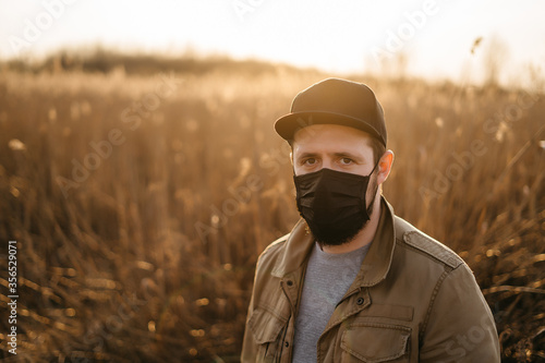 young guy in a protective mask  © Oleksandr