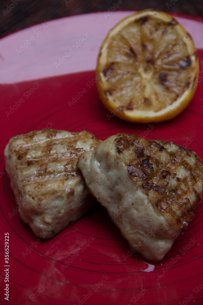 meat cutlets with vegetables close-up on a decorative background. Fried meat, meat dish meat cutlets with vegetables close-up on a decorative background. Fried meat, meat dish
