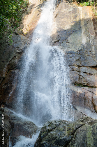 Secret tropical waterfall in jungle on a Samui island.